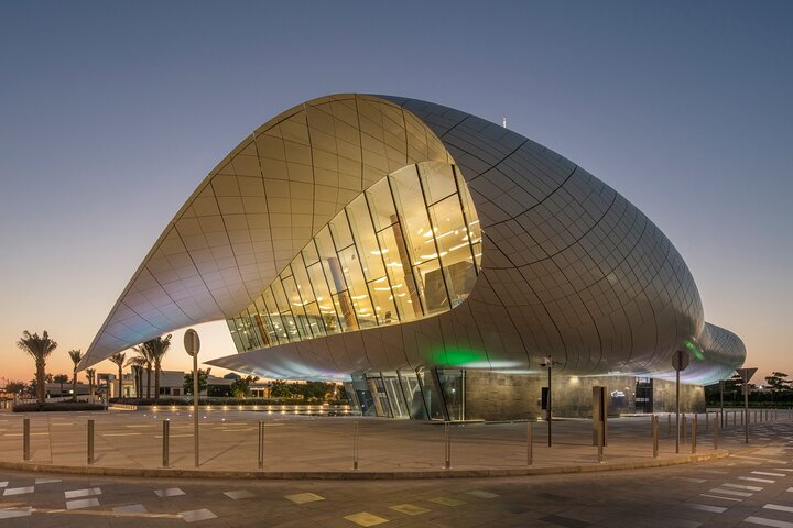 Discover the striking architecture of the Etihad Museum where history meets modern design. Explore interactive exhibits and enjoy serene garden walks and delightful café treats.